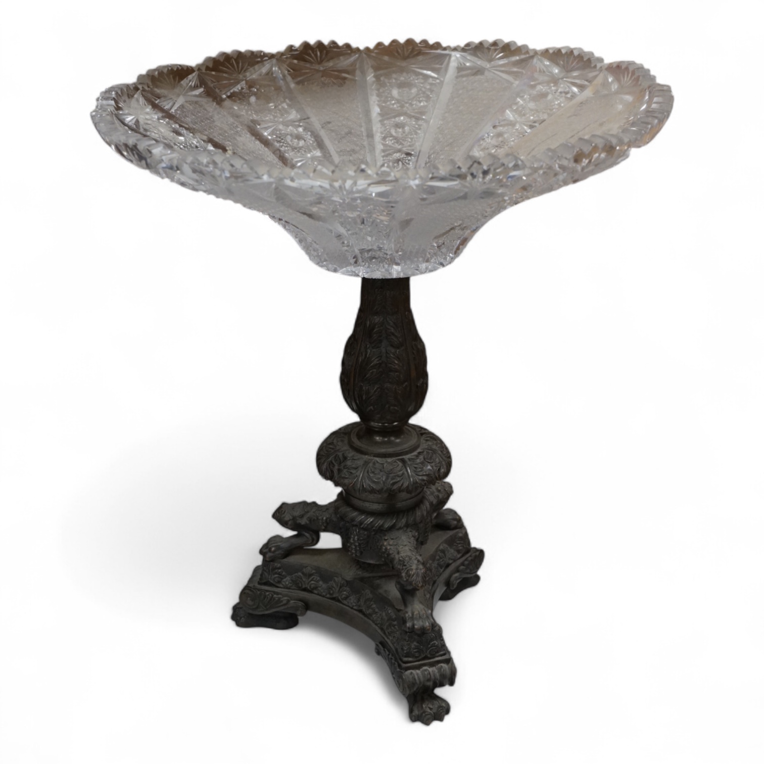 A large cut glass tazza, on bronze tri-form pedestal base, 39cm high.